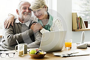 Modern grandparents chatting with their granddaughter photo