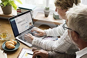 Modern grandparents chatting with their granddaughter