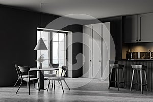 Modern gray kitchen corner with dining table and bar