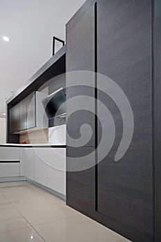 Modern gray wood lacquer white paint and oak kitchen cabinet equipment, luxury in a home