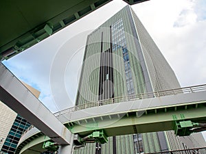 Modern green building with sky