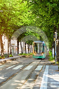 Modern green tram in Helsinki