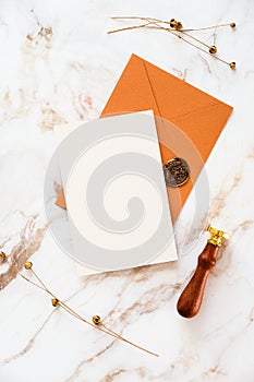 Modern greeting card with wedding stationery on marble background. Autumn style