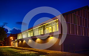 Modern gym building at night