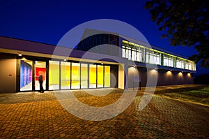 Modern gym building at night