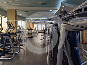 Modern gym equipment interior for weight loss and more healthy and active life for increasing strength and endurance