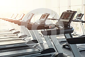 Modern gym interior equipment, treadmill control panels for card