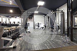 Modern gym interior with various equipment