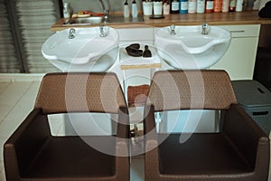 modern hair studio with chairs and salon backwash unit photo