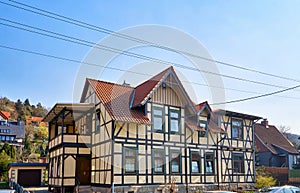 Modern half-timbered house with many windows in Wernigerode. Saxony-Anhalt, Germany