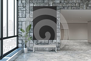 Modern hall way interior with empty black mock up poster on concrete tile wall, decorative plant and window with city view.