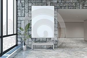 Modern hall way interior with empty white mock up poster on concrete tile wall, decorative plant and window with city view.