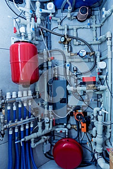 Modern heating system in boiler room. Automatic control unit.