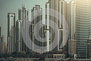 Modern high buildings, Dubai skyline, UAE in summer evening