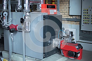 Modern high power industrial gas boiler with natural gas burner in the gas boiler plant