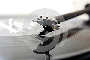 Modern high quality turntable record player playing a vinyl analogue music LP