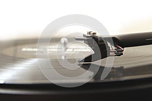 Modern high quality turntable record player playing a vinyl analogue music LP