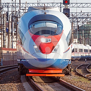 Modern high-speed train departs from Moscow.