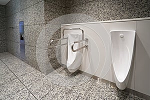 Modern high tech toilet with electronic bidet in Japan. Industry leaders recently agreed on signage standards for Japanese toilet