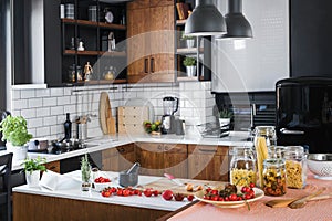 Modern home kitchen interior with fresh ingredients ready for cooking.