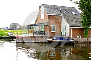 Modern home with a terrace along the Loosdrecht Lakes, Netherlands