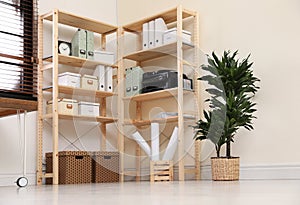 Modern home workplace with wooden storage