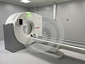 Modern hospital Computed Tomography room interior with device