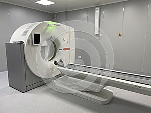 Modern hospital Computed Tomography room interior with device photo