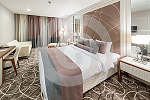 The modern hotel room with big bed