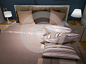 Modern hotel room interior - bed and pillows