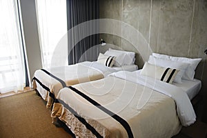 Modern hotel room with twin beds interior