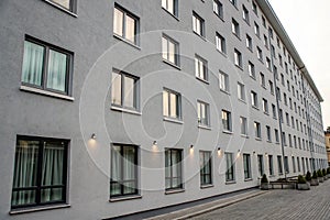 Grey hotel wall with windows