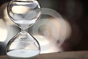 Modern Hourglass on bokeh background