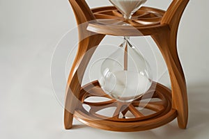 Modern hourglass on light background