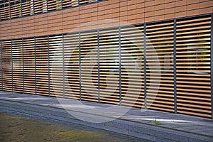 Modern house facade with elaborate exterior cladding.