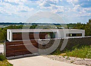 Modern house with stone fence