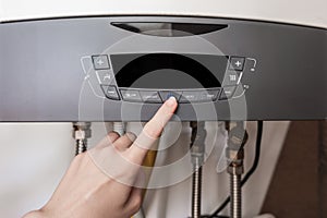 Modern house water heater control panel. The fall of the cold weather and the rise in consumer prices