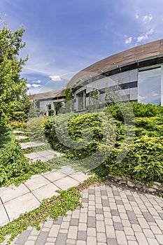 Modern housefront surrounded by plants photo