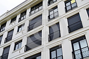 Modern housing apartments and details. Facade, center.