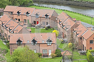 Modern housing development by river
