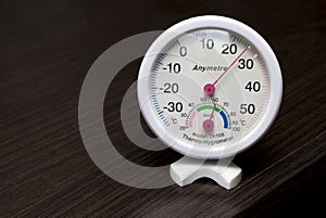 Modern hygrometer thermometer to measure temperature and humidity in the room