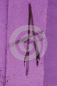 Modern iconic urban culture - tag graffiti letter. Wall decorated with abstract drawings house paint closeup. Detail of tag