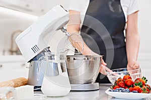 modern immersion mixer in the kitchen for baking and desserts.