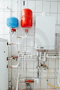 Modern independent heating system in boiler room