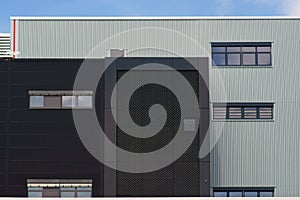Modern industrial building with grilles