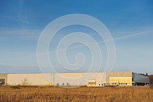 Modern industrial building over blue sky