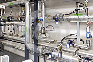 Modern industrial building with pipes, heat exchangers and valves