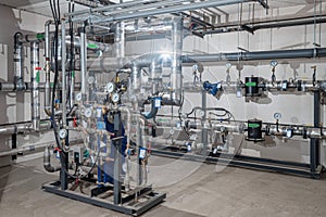 Modern industrial building with pipes, heat exchangers and valves