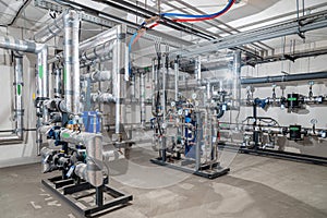 Modern industrial building with pipes, heat exchangers and valves