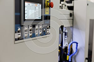 Modern industrial equipment with CNC control panel